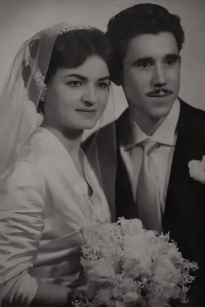 Photo of old black and white vintage wedding photo.couple in love
