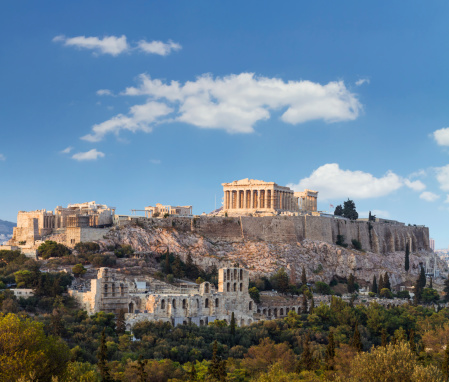 Temple of Concordia on hill top under blue summer skyscape. Aerial Drone Point of View Panorama at Valley of the Temples in Agrigento City. Stitched Mavic 3 Panorama Shot. Temple of Concordia, Valley of the Temples, Agrigento, Sicily Island, Southern Europe, Europe.