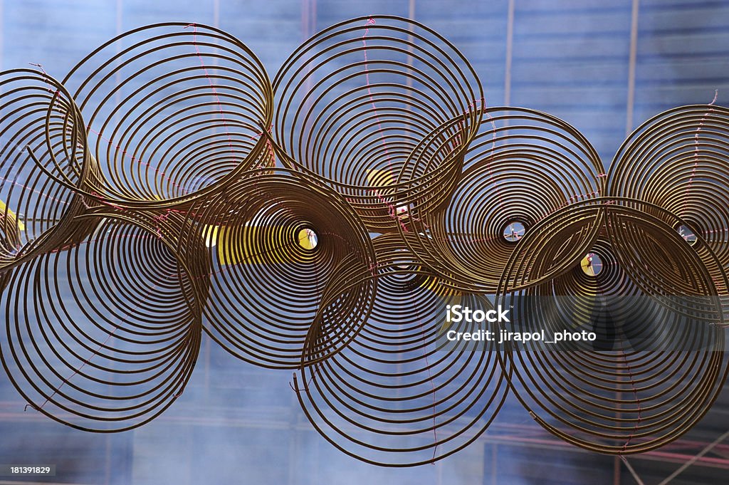 spiral incense Burning incense hanging under the temple roof Asia Stock Photo