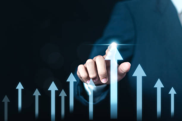 istock Business growth. Businessman analyzing economic growth graph and financial data, global economic trend analysis, planning business strategy, digital marketing. 1813931422