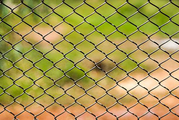 istock Metal mesh wire fence 181393451