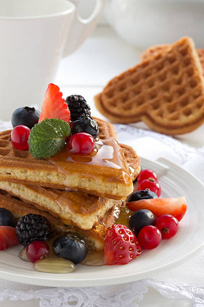 istock Waffles with honey and berries. 181394639