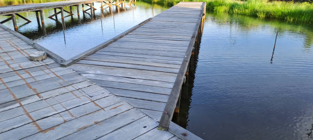 istock Rustic wooden bridge over a pond 1813964307