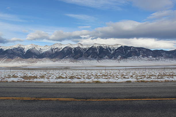 istock Snow Covered Peaks Colorado 181397915