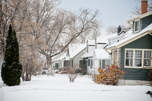 Winnipeg's winter story unfolds in these genuine images of local homes. A serene blend of snow-covered landscapes and cozy residences, inviting you to explore the heart of Canadian winter.