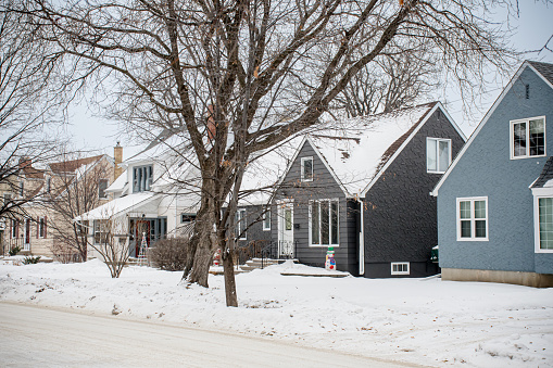 Winnipeg's winter story unfolds in these genuine images of local homes. A serene blend of snow-covered landscapes and cozy residences, inviting you to explore the heart of Canadian winter.