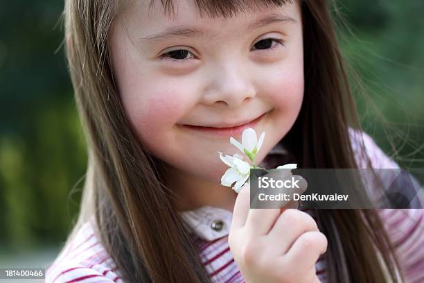 Portrait Of Girl Stock Photo - Download Image Now - Child, Down Syndrome, Springtime