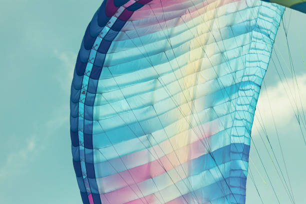 istock Colorful paraglider close-up against the blue sky 1814022471