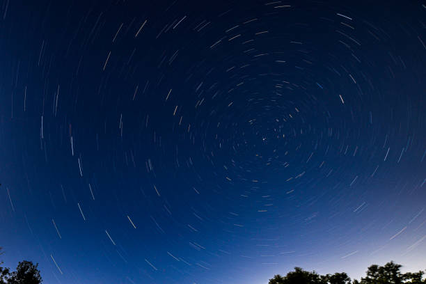 istock Long Exposure Star Trails Centered on Polaris 1814022485
