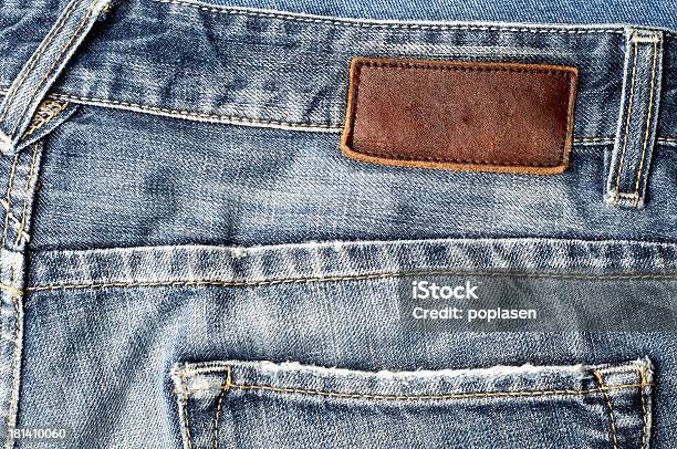 Etichetta Di Jeans In Pelle Bianco - Fotografie stock e altre immagini di Abbigliamento - Abbigliamento, Abbigliamento casual, Blu