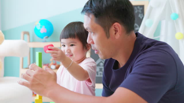 Asian father accompany with kid