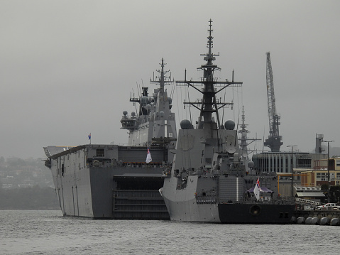 Navy ship in the port, background with copy space, full frame horizontal composition