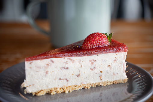 A plate of strawberry cheesecake served for morning tea.