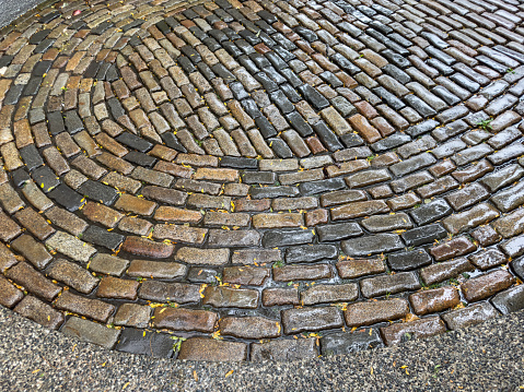 Full frame photo of a cobblestone road in daytime