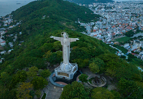 Rio De Janeiro, Brazil - February 11, 2015: Rio de Janeiro, Brazil : Aerial view of Christ and Botafogo Bay from high angle. Statue is located on Corcovado Hill and is facing the city and Guanabara Bay.