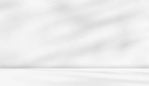 istock Empty gray room studio with shadow on wall and floor for product presentation. 1814203685