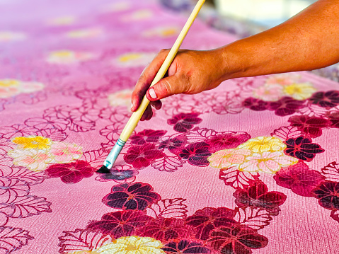 Batik fabric with beautiful colorful patterns It is a handicraft of local people in Thailand.