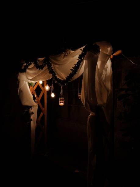 istock Wooden pergola illuminated with candlelight 1814257894