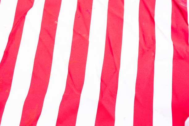 istock horizontally-oriented flag background with red and white stripes filling 1814259471