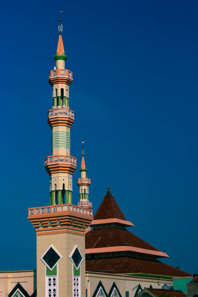 istock Tower masjid with blue sky background 1814290044