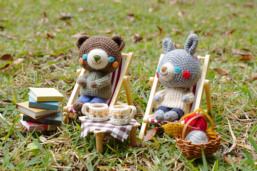 Handmade knitted toy. cute and small animal Amigurumi doll.
