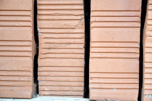 Roofing clay tiles for construction work.
