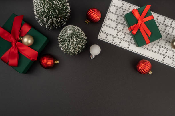 istock Home office table with Christmas decorations, keyboard. Flat lay, top view. Christmas workspace. 1814305151