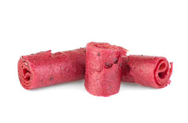 Natural and healthy snack food - fruit pastille from apples, raspberry and currant on a white background. Fruit Marshmallow.