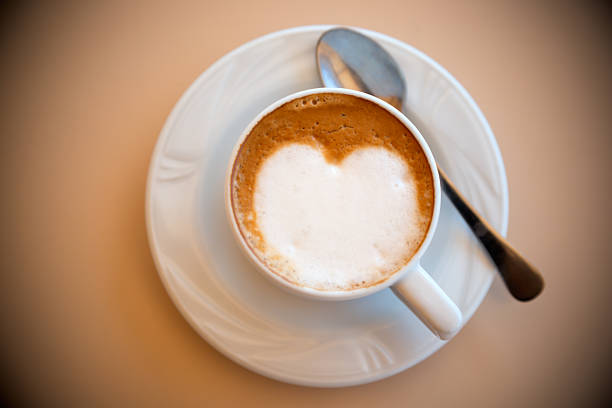 istock Cup of coffee with heartshaped milk 181433104