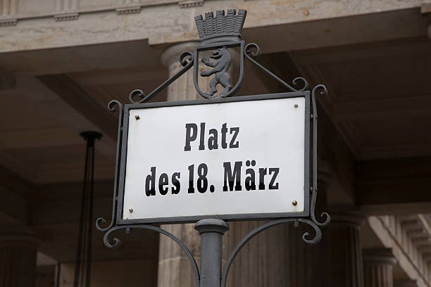 istock Eighteenth May Street Sign; Brandenburg Gate; Berlin 181435908