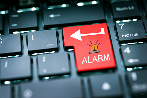 Alarm sign on computer keyboard