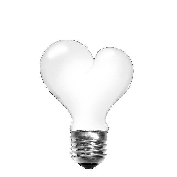 istock Light bulb in shape of heart isolated on white 181441489