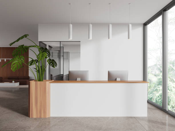 istock White office waiting room with reception and couch 1814416616