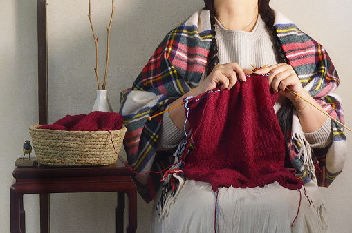 Woman Knitting Wool Knit/Studio Shot