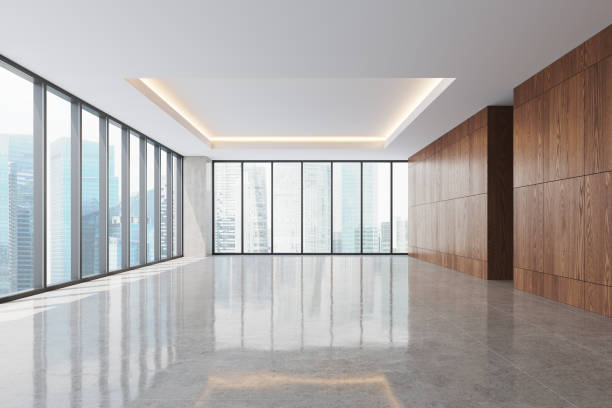 istock Light empty business hall with panoramic window on Singapore skyscrapers 1814421324