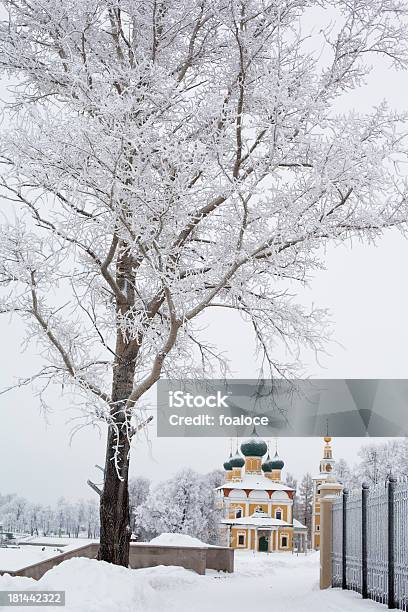 White Trees And Yellow Church Stock Photo - Download Image Now - Architectural Dome, Architecture, Black Color