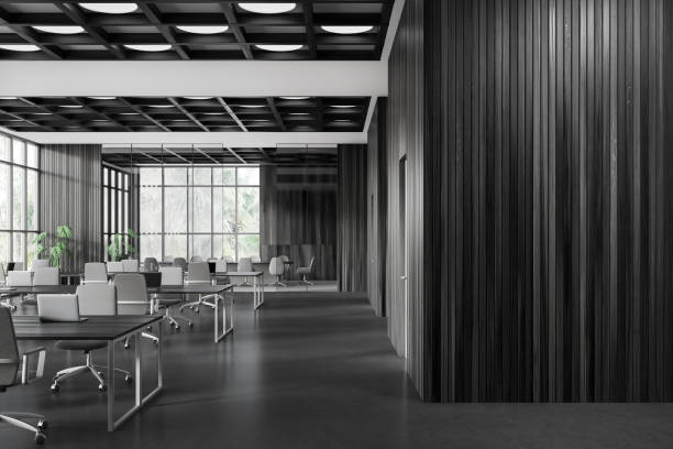 istock Dark wooden open space office and board room with blank wall 1814438328