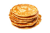 Small pancakes stacked on top of each other, high angle studio shot isolated on white background