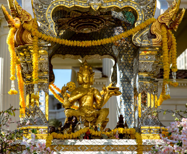 istock Buddhist temple on Las Vegas Boulevard with solid gold Buddha statue for meditation at Caesars Palace hotel, casino and resort in the middle of the Las Vegas Strip. 1814542196