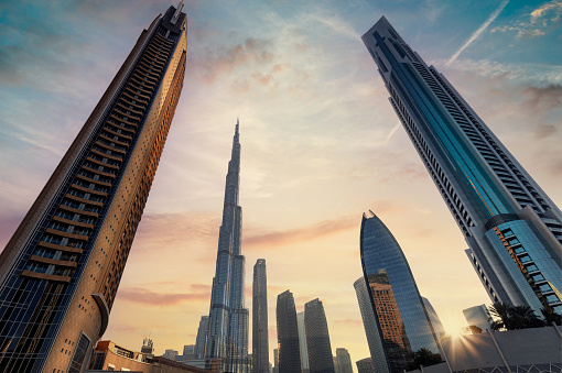 UAE, Dubai panoramic skyline view of city downtown and Dubai Mall. Aerial view of City Buildings during sunset, Dubai, United Arab Emirates