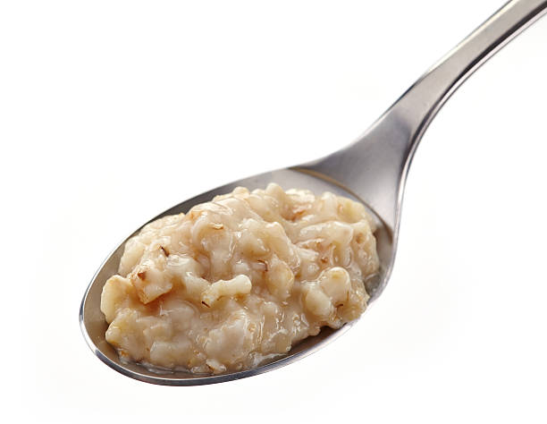 istock Spoon of oats porridge 181456913