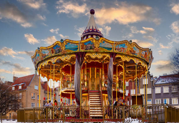 istock Shiny children's carousel with toy horses 1814582394