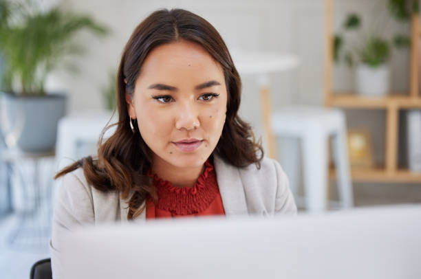 istock Business, office or woman typing on computer working on email or content research project online. Technology, seo data feedback or girl journalist writing blog reports or internet articles with focus 1814593311