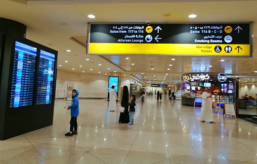Dammam Saudi Arabia, June 21 2023, Passangers arrive at King Fahd International Airport during summer vacation night.