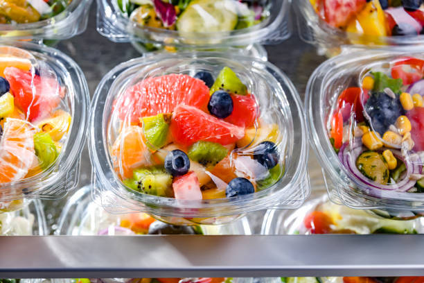 istock Boxes with pre-packaged fruit salads in a commercial fridge 1814606929