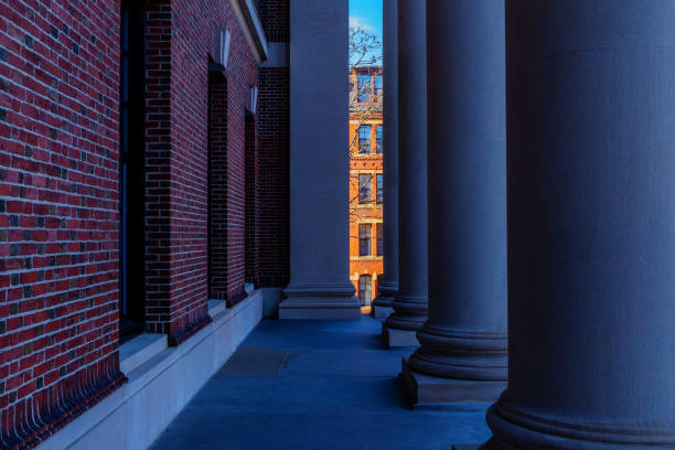 New, modern high school building entrance and driveway. Red brick construction. Beautiful windows. 