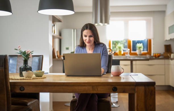 istock Woman Talking In Web Conference On Laptop 1814650873