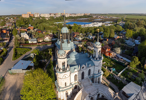 Russia, Bykovo-May 23, 2022: Aerial view The Church of the Vladimir icon Of the mother of God Nativity of Christ in the Russian Gothic style in the Bykovo estate,Russia, was built in 1789,vertical