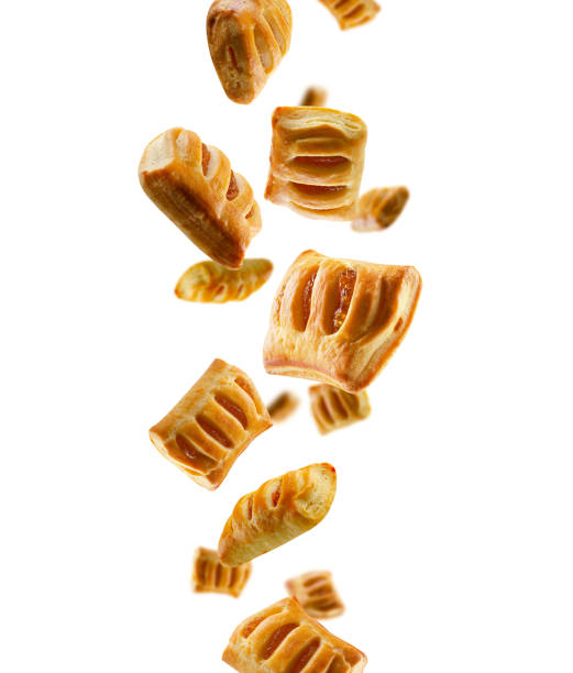 istock Strudels with lemon jam fall in space. Surround back light. Isolated on white 1814659610