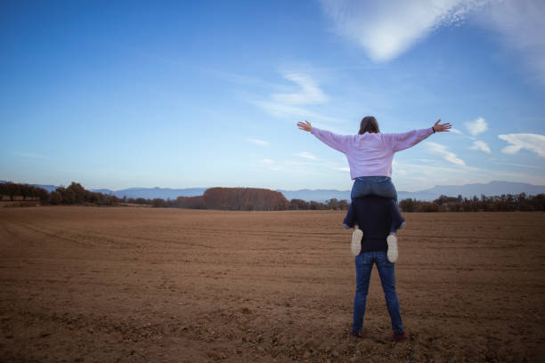 istock Couple in the open field 1814663836